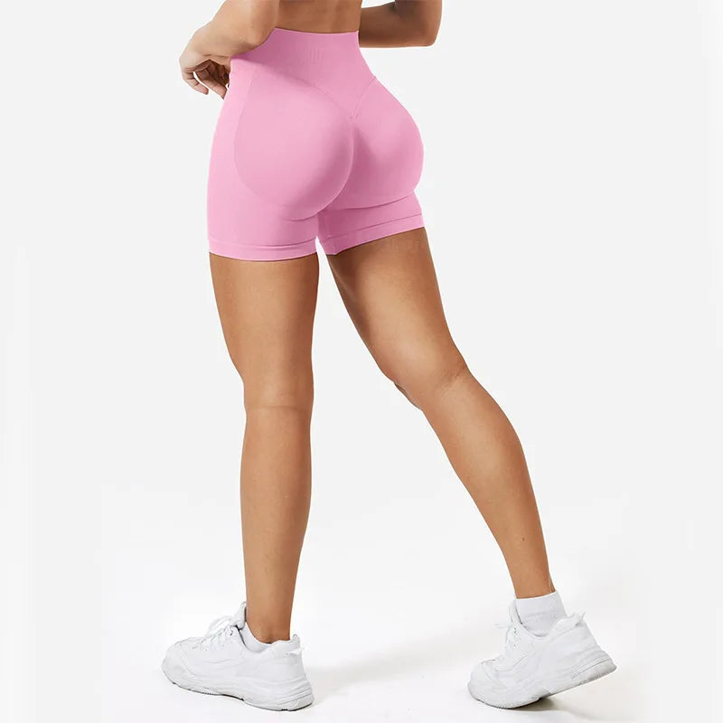 Seamless low ribbed shorts in pink, offering comfort and style for fitness activities.