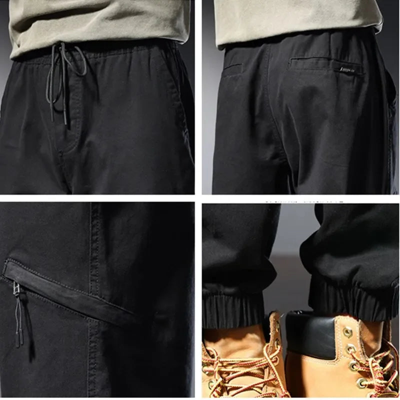 Close-up of cargo trousers for men showcasing pockets and adjustable cuffs in black fabric.