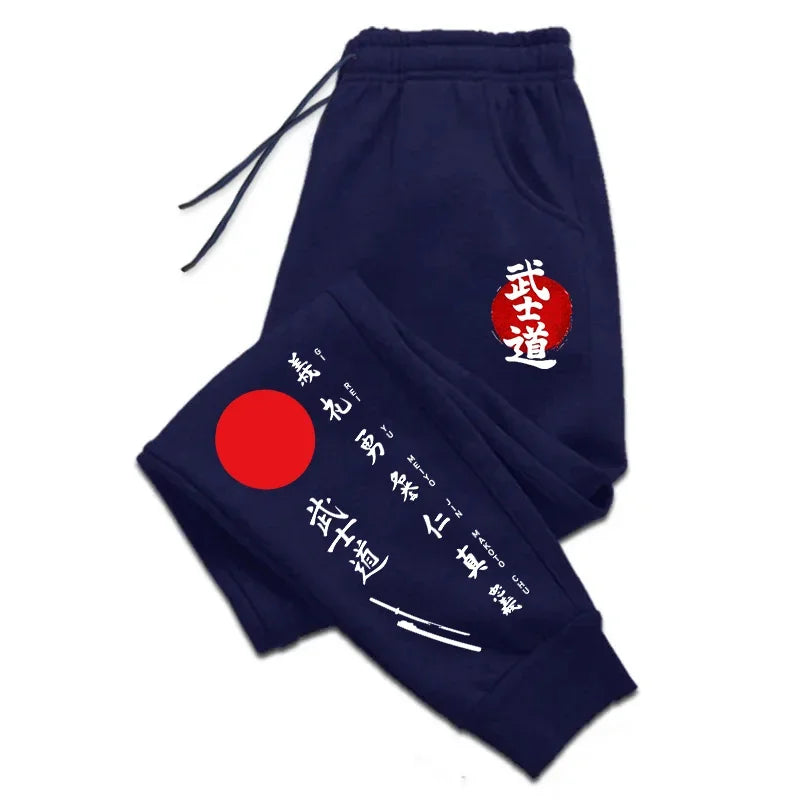 Bushido printed sweatpants featuring a logo and Japanese text on navy blue fabric.