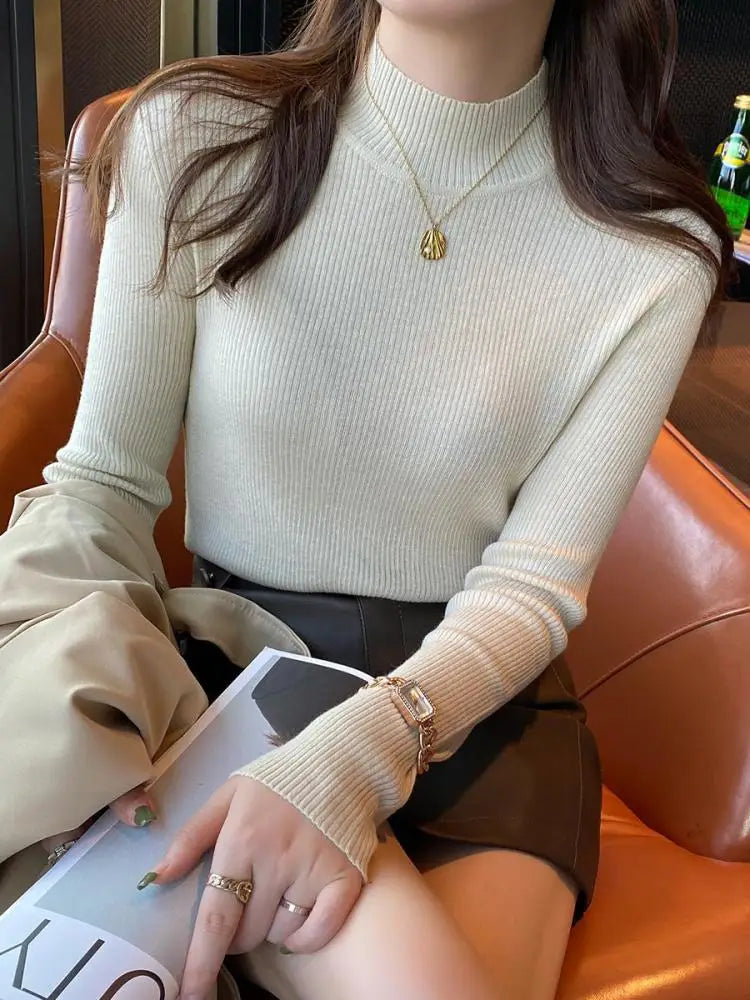 Vintage mock neck women sweater in cream color, stylish ribbed design, perfect for autumn and winter wardrobe.