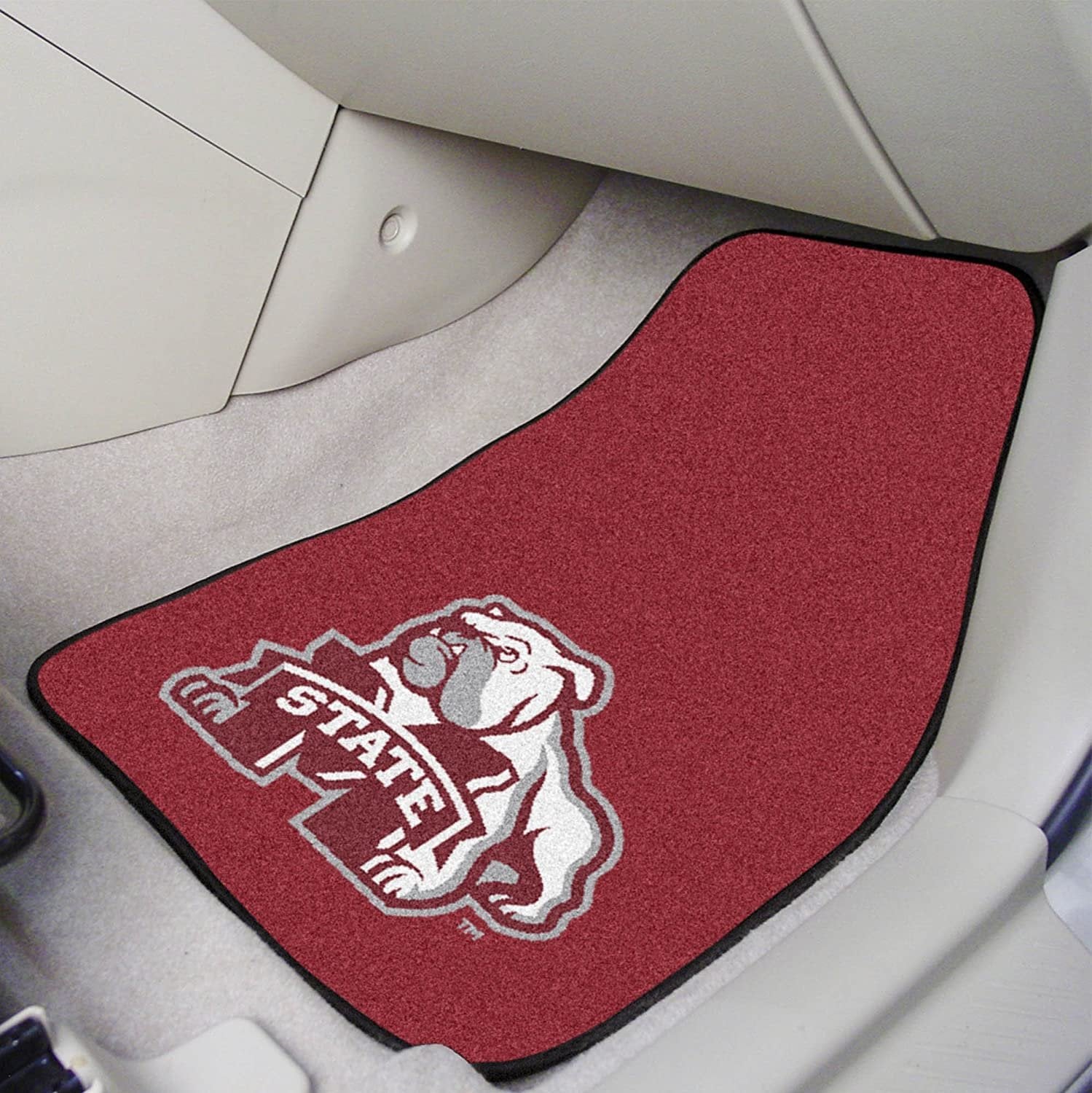 Mississippi State Bulldogs floor mats featuring a high-resolution logo in a vehicle interior.